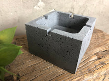 Load image into Gallery viewer, A high-quality concrete ashtray with a perfect cubist design that will delight smokers with its functionality.