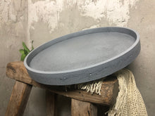 Load image into Gallery viewer, Concrete round tray, handcrafted for your indoor or outdoor space. Shown here in concrete gray.
